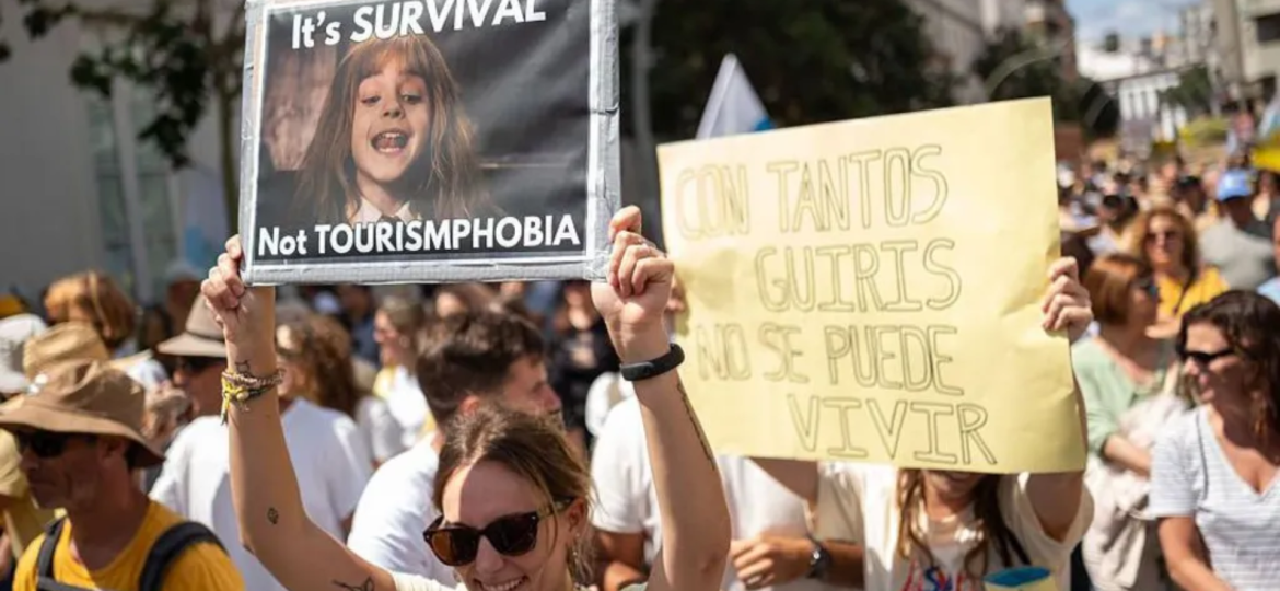 Spain targets Airbnb rentals as locals protest