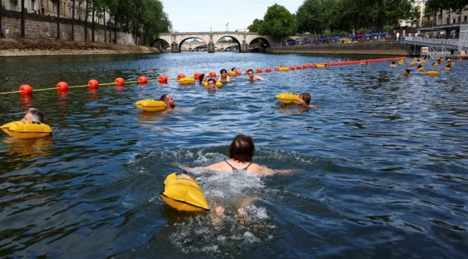 The river seine welcomes swimmers again after 100 years