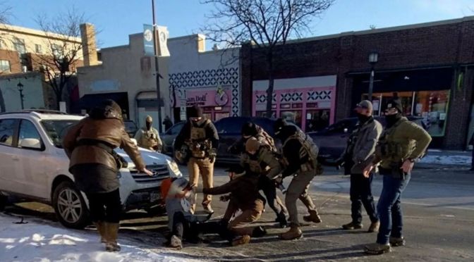 Protests erupt in Minneapolis after man shot dead during immigration raid