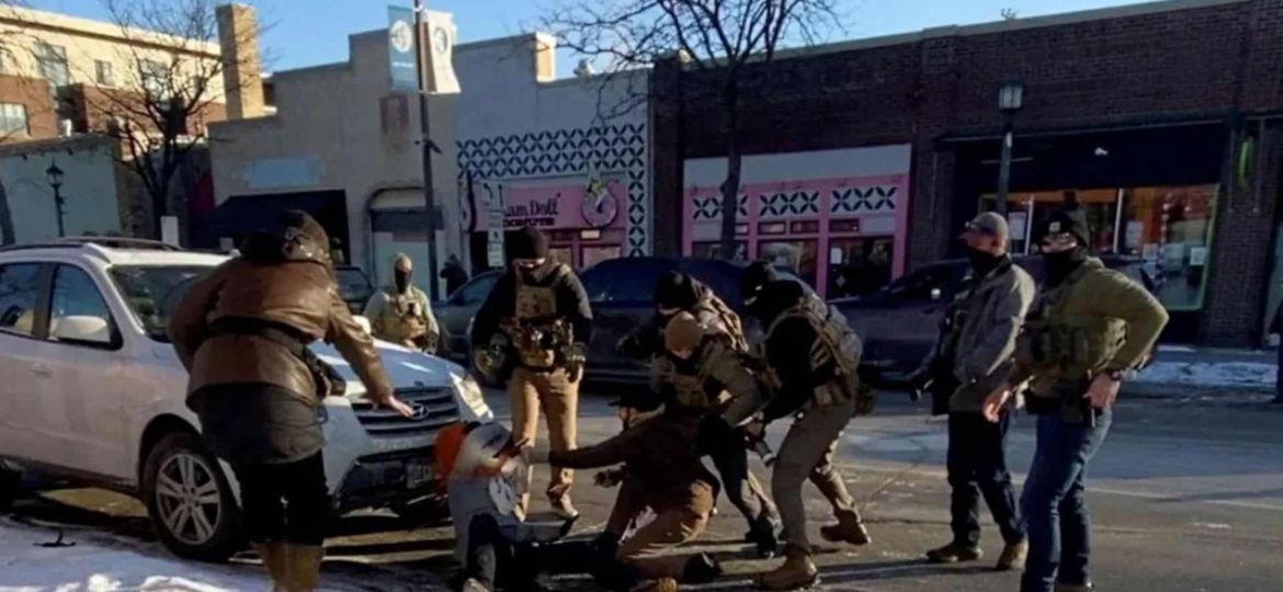 Protests erupt in Minneapolis after man shot dead during immigration raid