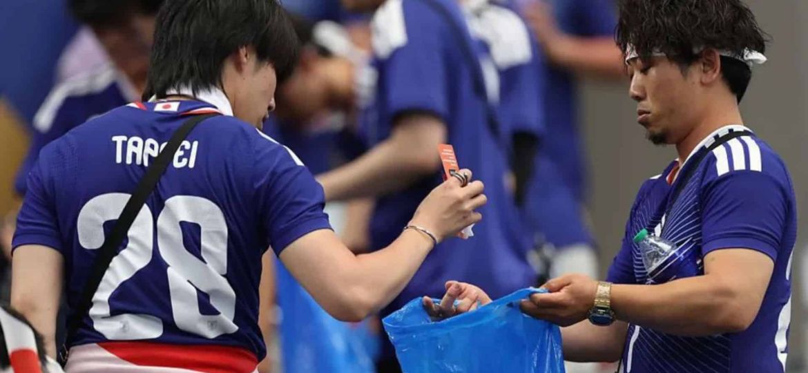 Japanese fans’ stadium cleanups spark debate at home